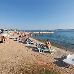 In Апартаменти